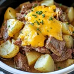 Slow Cooker Steak and Cheddar Potato Casserole
